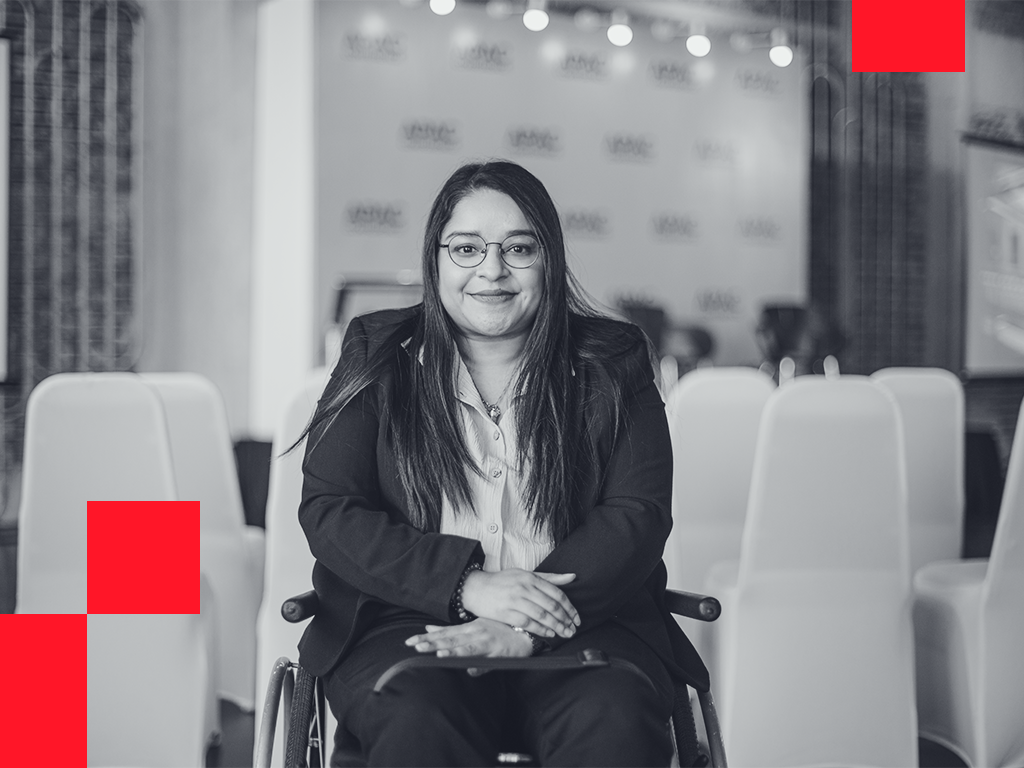 Confident business lady on a wheelchair for a seminar.