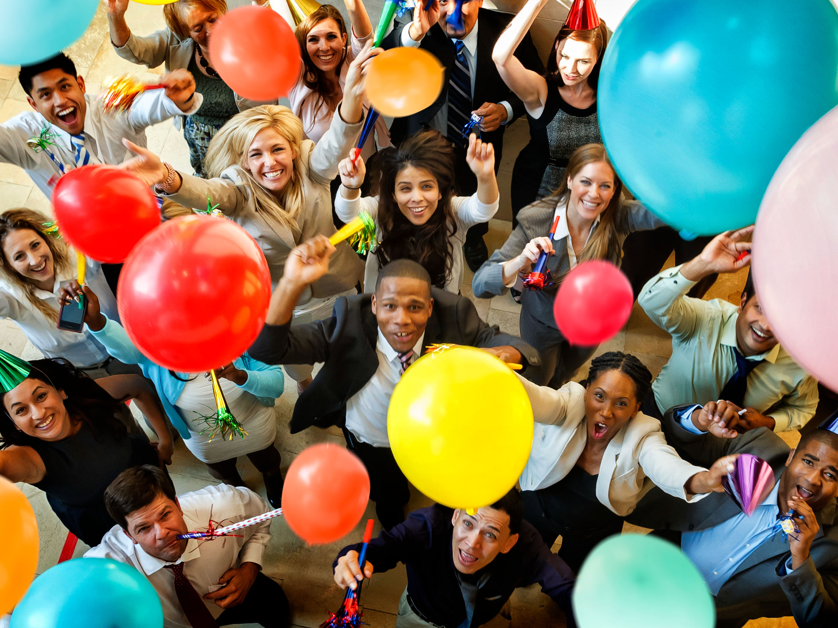 Employees celebrating in the workplace.